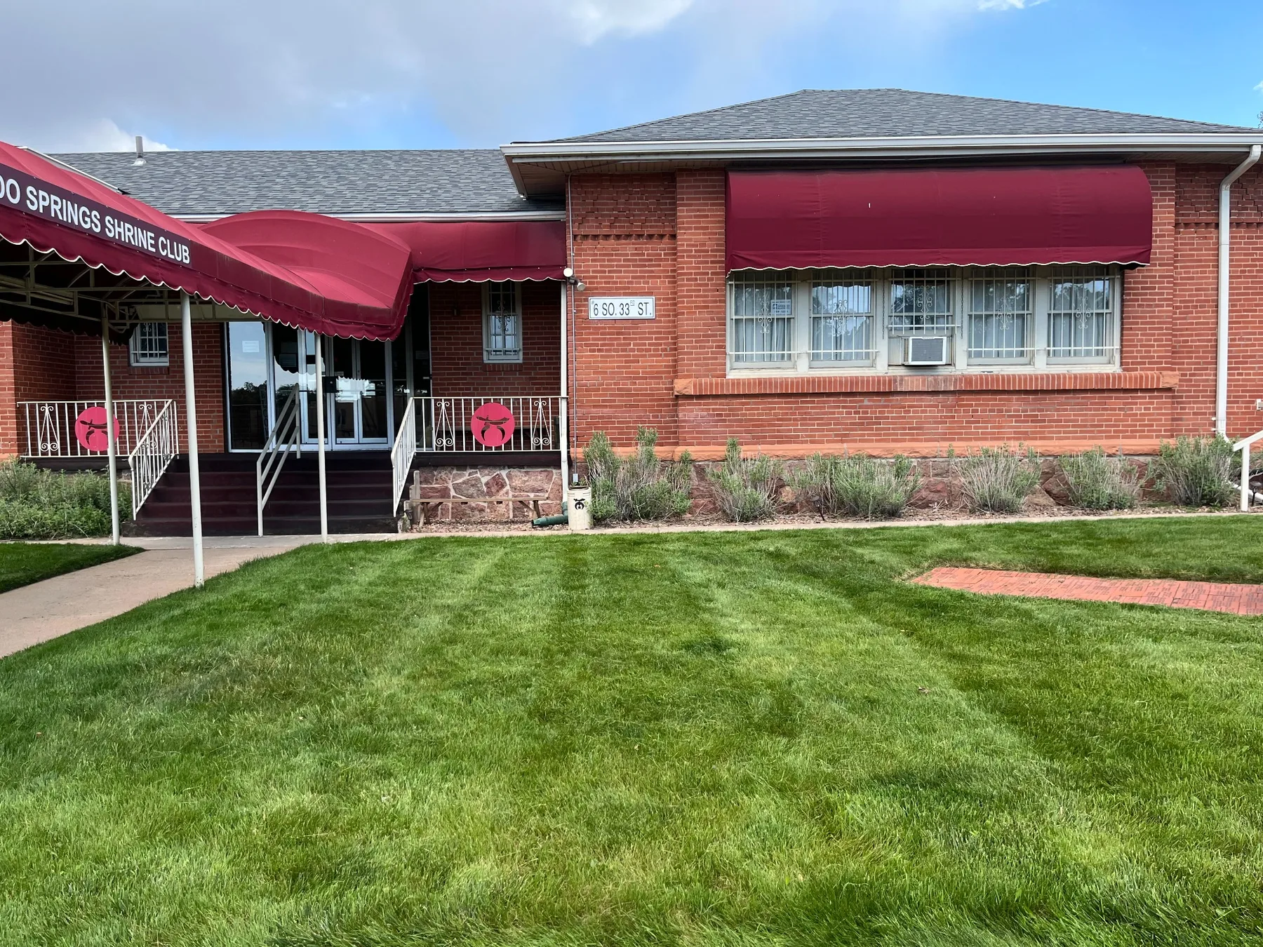 Commercial lawn maintenance at a Colorado Springs property